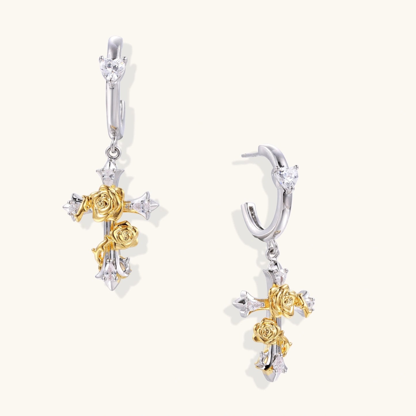 Dainty hoop earrings with crystal studs and dangling cross pendants featuring gold rose details and zirconia accents