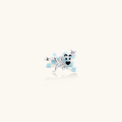 Adjustable white gold-plated ring with 3D blue enamel puppy wearing crystal crown on beige background